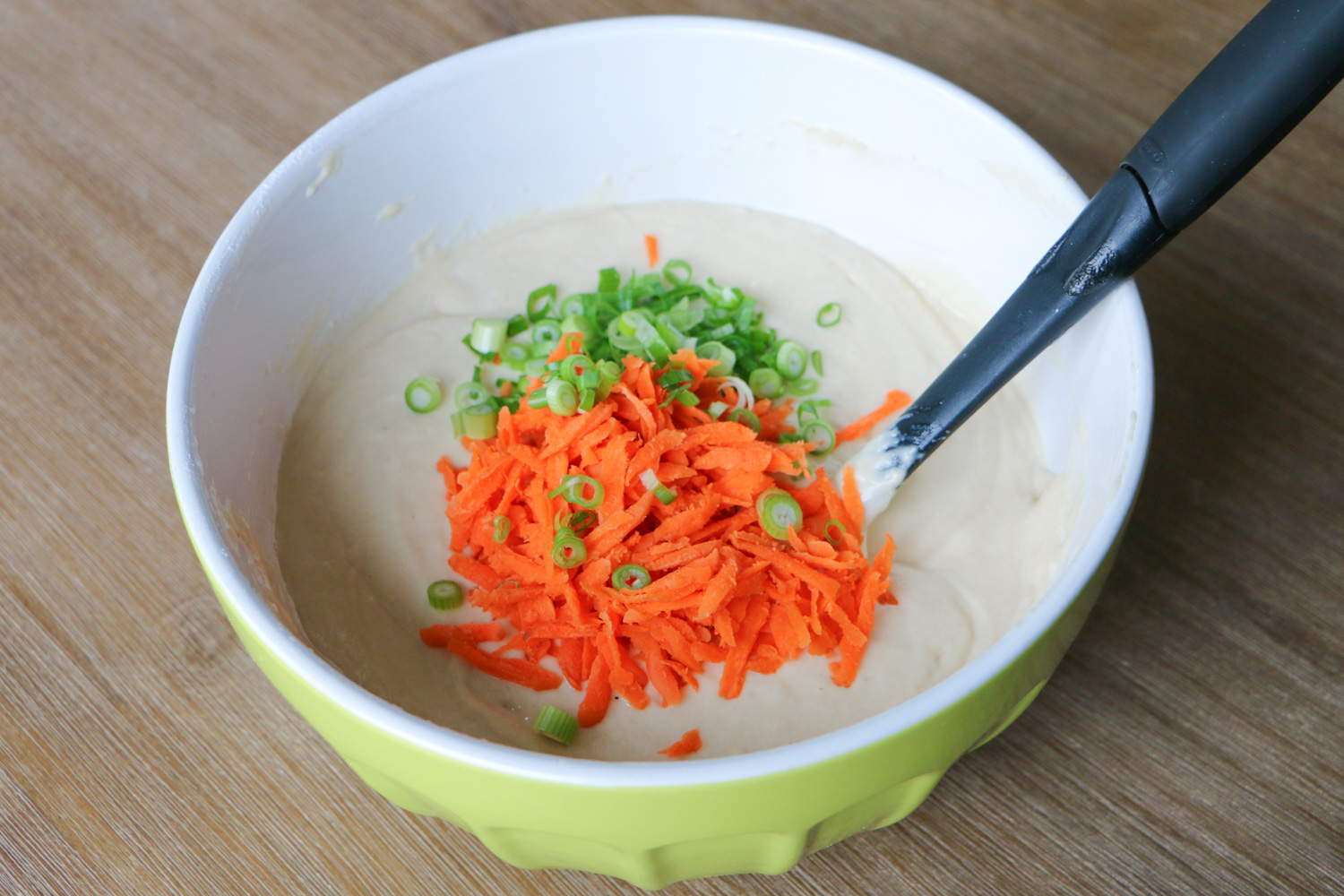 Waffle batter with grated carrots and onions